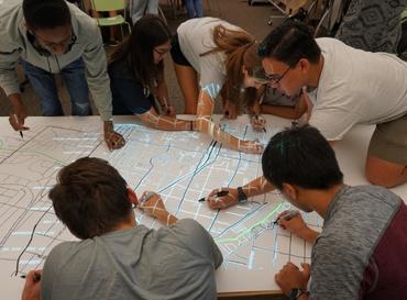 Students explore data around Atlanta through the Map Room research.