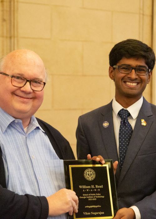 Vikas receiving an award