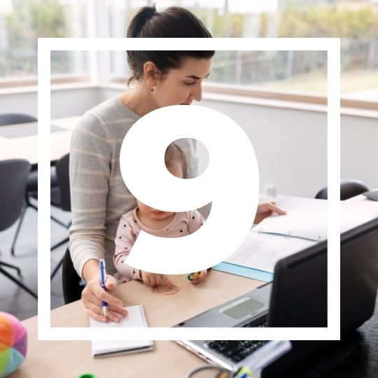 stock photo of a woman working with her baby on her lap and the number 9 overlayed on top of it.
