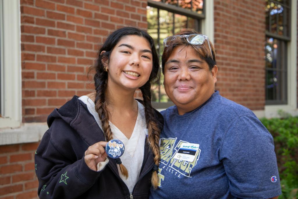 An Insta student with her parent on family day