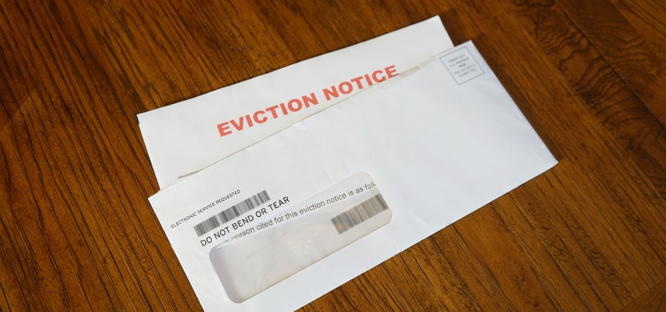 Eviction notice letter on wooden table