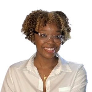 Portia Carter poses, smiling, against a white background.