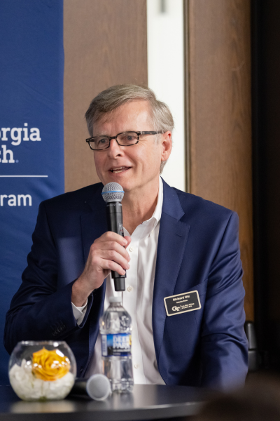 Interim Dean Richard Utz speaks into a microphone