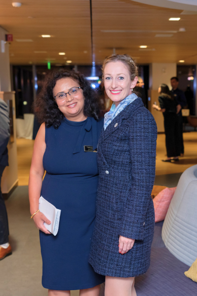 Cassidy Sugimoto and Meenu Mukherji pose together at the evening celebration.