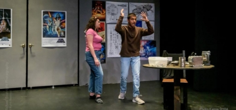 Angela Wrigley, left, as Claire, and Shrey Patel, right, as Scott, perform a scene on the set of Orbital Debris.