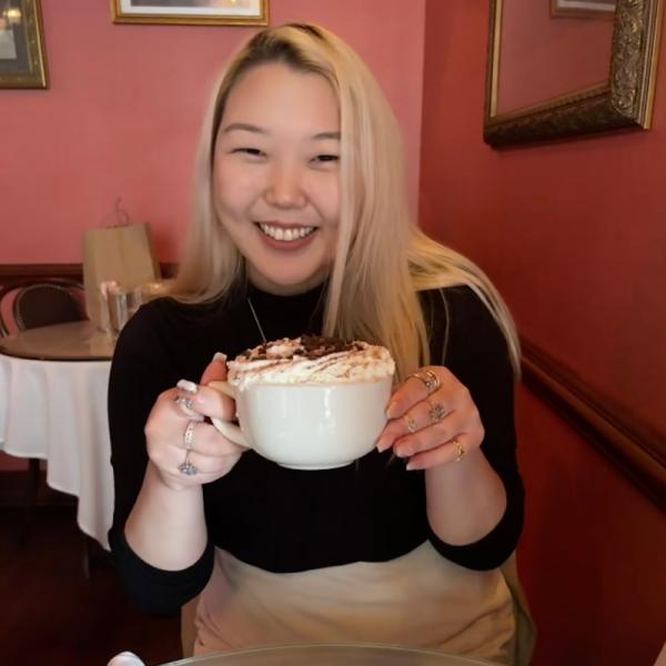 Michelle Lee posing with coffee