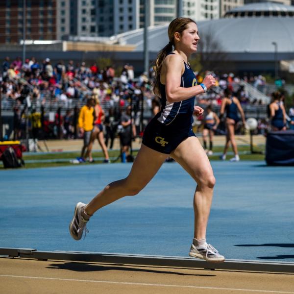 Reagan Elizabeth Mahoney running on a track