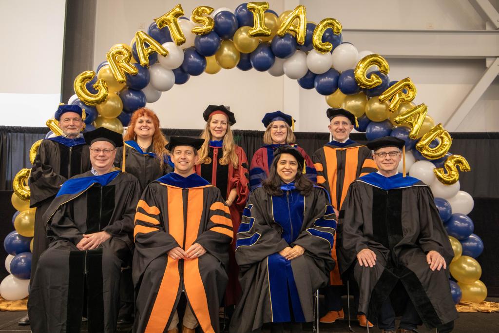 faculty members on stage