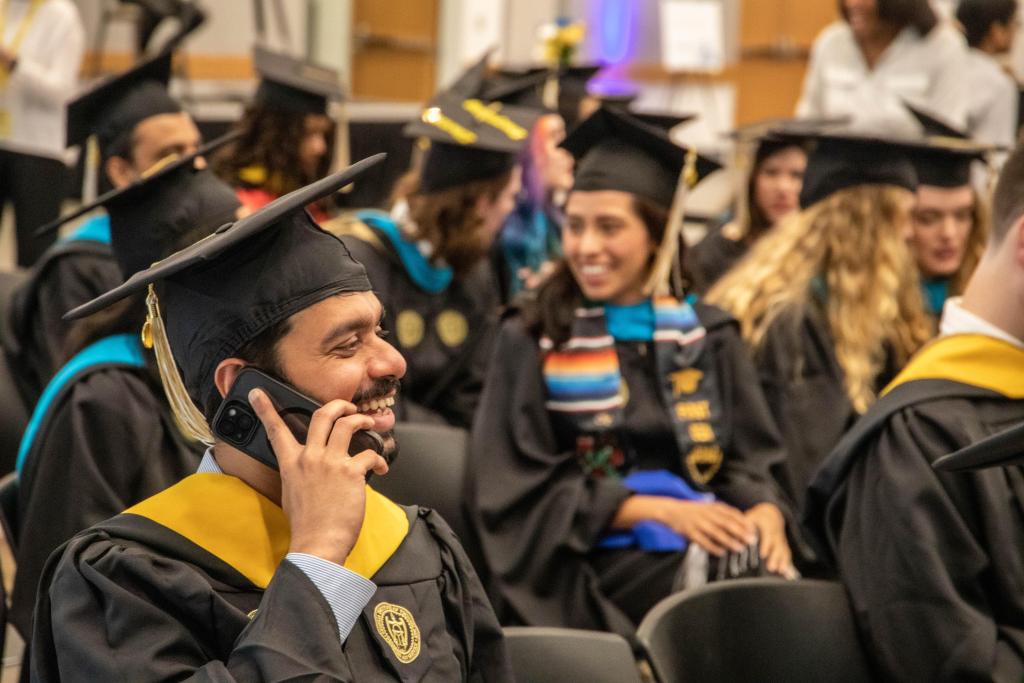 grads chatting before the ceremony