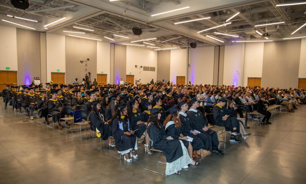 students and guests seated in the audience