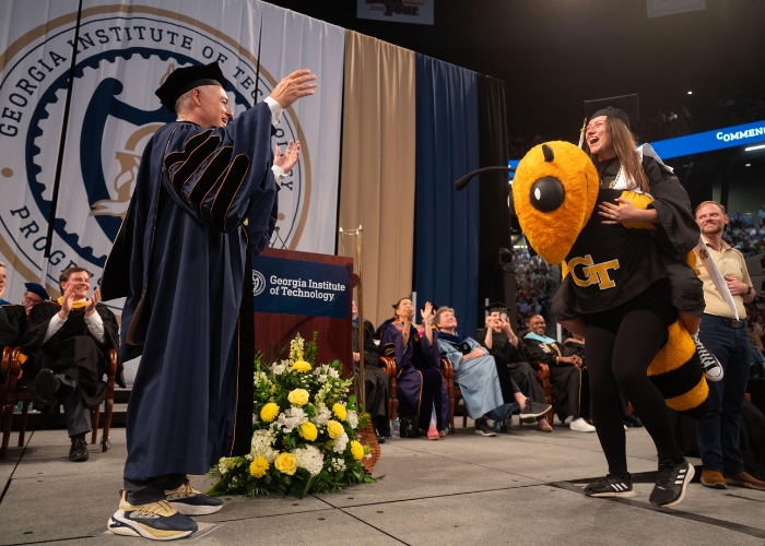 Grad crossing stage on Buzz's back