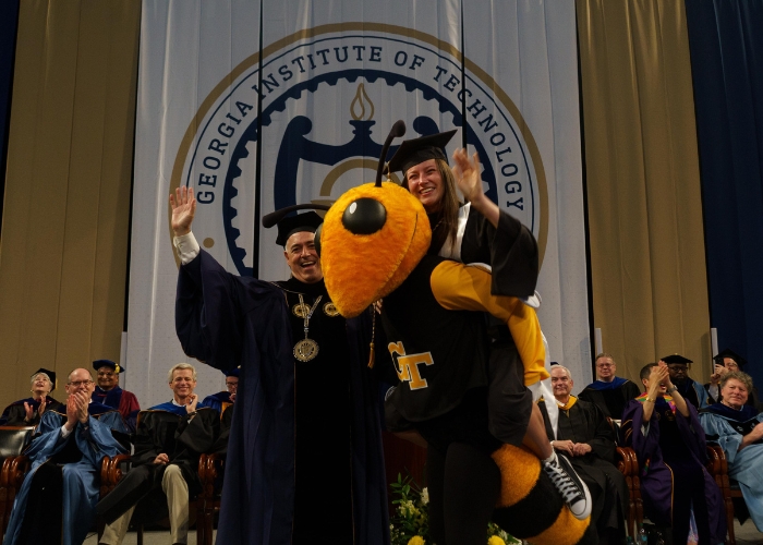 Grad crossing stage on Buzz's back