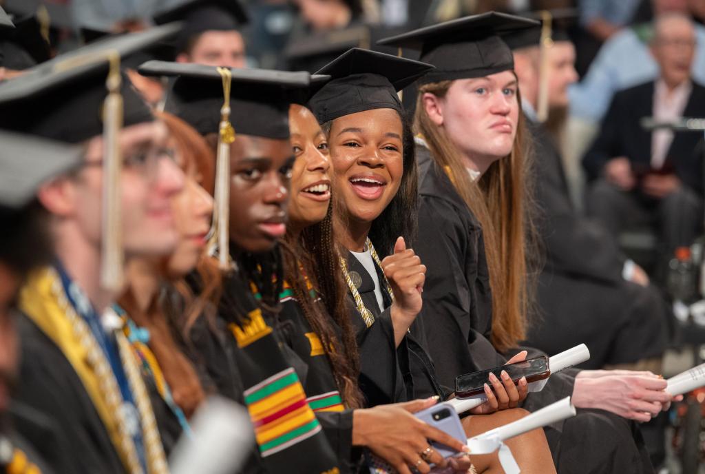 students with degrees in the audience