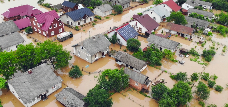  Aerial view of flooded houses with dirty water of Dnister river in Halych town, western Ukraine.
