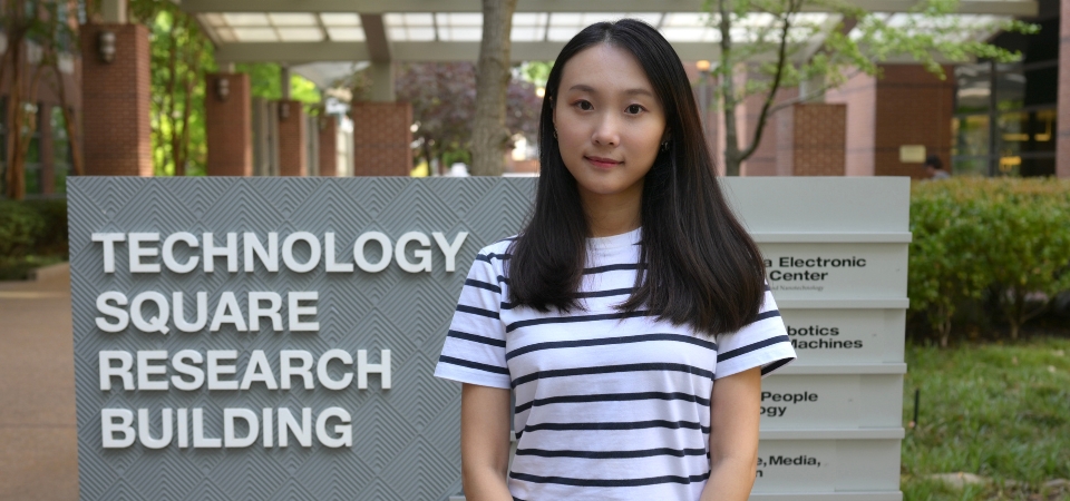 Shi Ding, Digital Media Ph.D. student, standing in front of the Technology Square Research Building.
