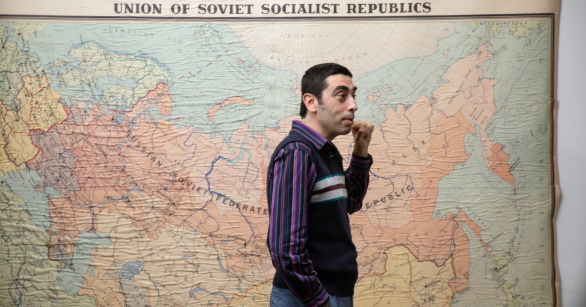Kemal Budak teaches in front of a map of the USSR in the School of History and Sociology at Georgia Tech