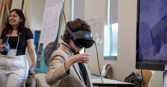Student using VR at the Digital Media demo day