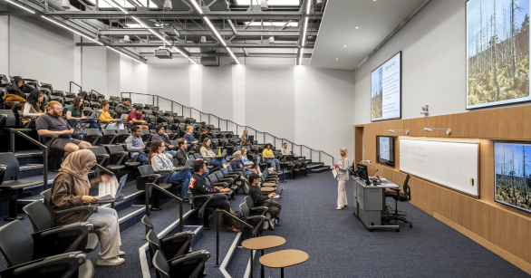 Professor Marilyn Brown teaching a class in the new DM Smith building