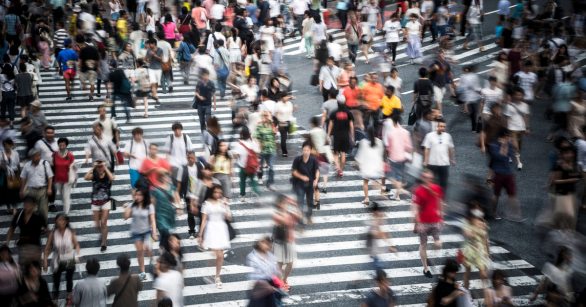Crowd of people crossing the street in Japan