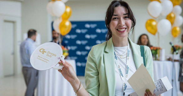 Student at the MS in Cybersecurity graduation ceremony