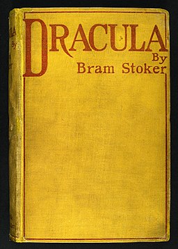 A blank yellow book cover reading "Dracula By Bram Stoker" 