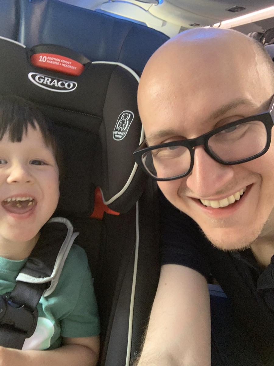 Daniel Dench takes a selfie with his toddler.