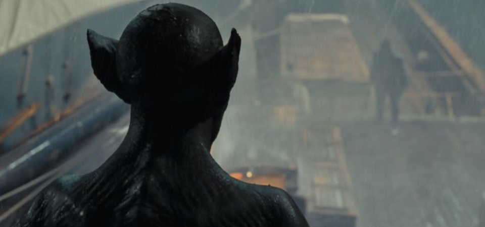 a batlike creature stands in the foreground, overlooking a ship's deck where a man is standing