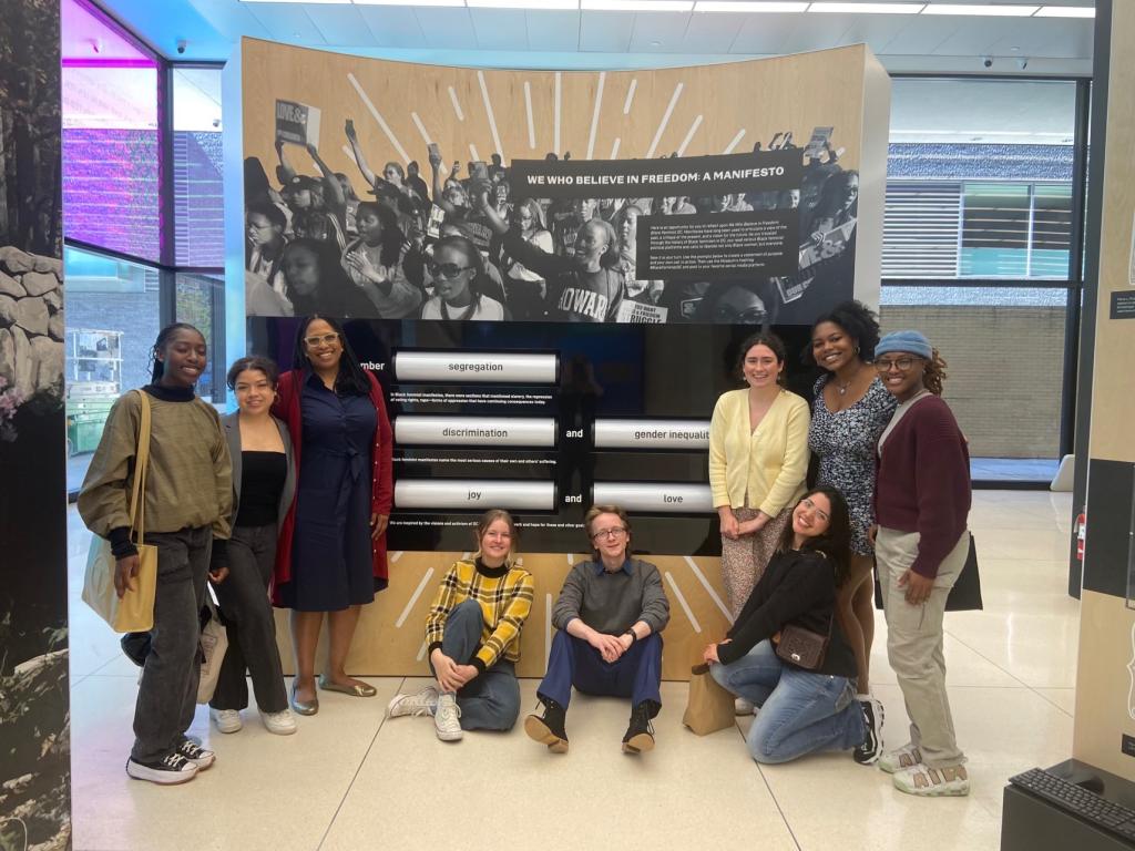 Students in Randolph's class posing at the exhibit in Washington, D.C.