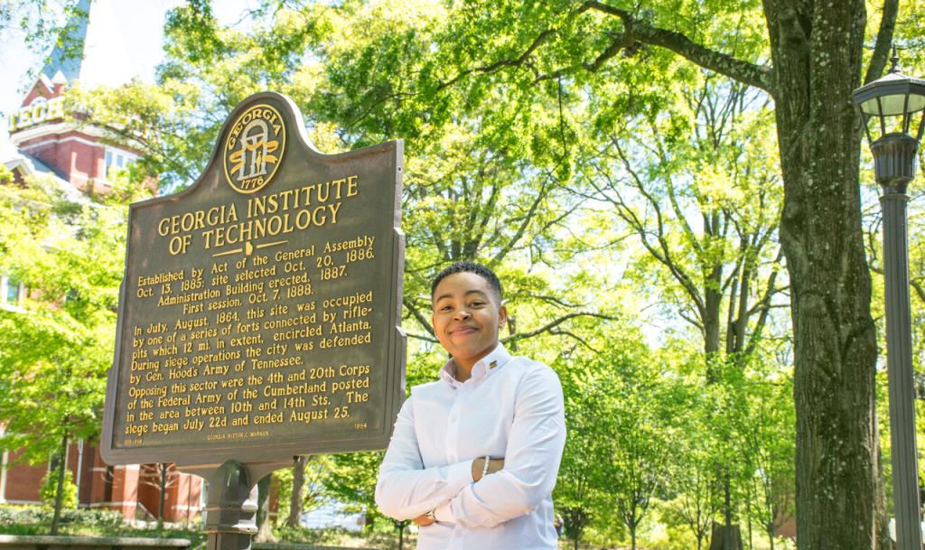 Rylee Calhoun in front of the Georgia Tech sign