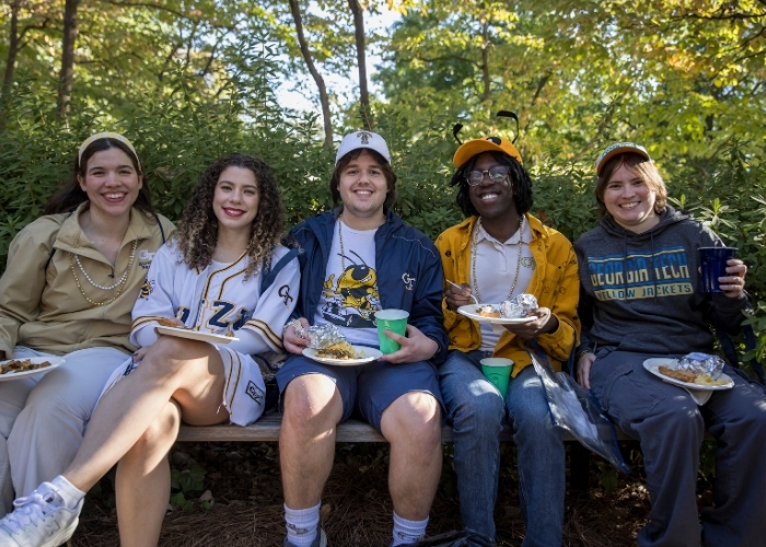Students at the IAC homecoming tailgate 