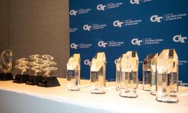 a set of awards on a table